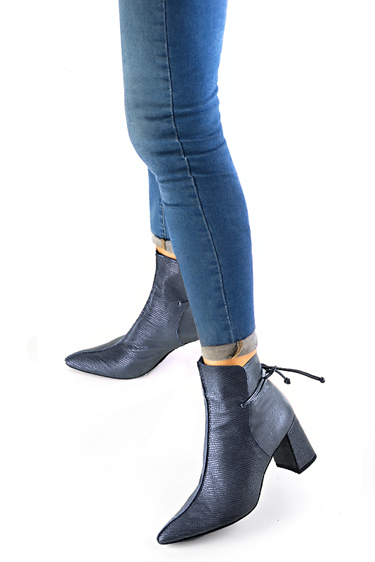 Denim blue women's ankle boots with laces at the back. Tapered toe. High flare heels. Worn view - Florence KOOIJMAN